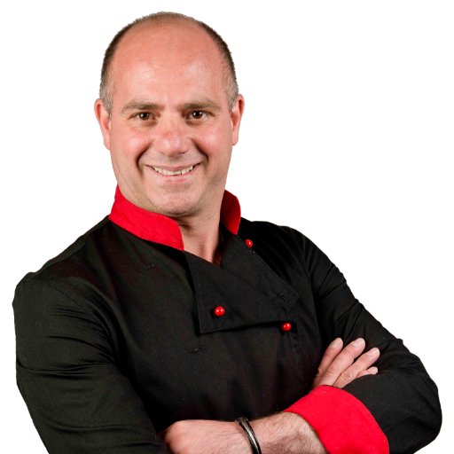 Chef Enzo Oliveri plating a dish